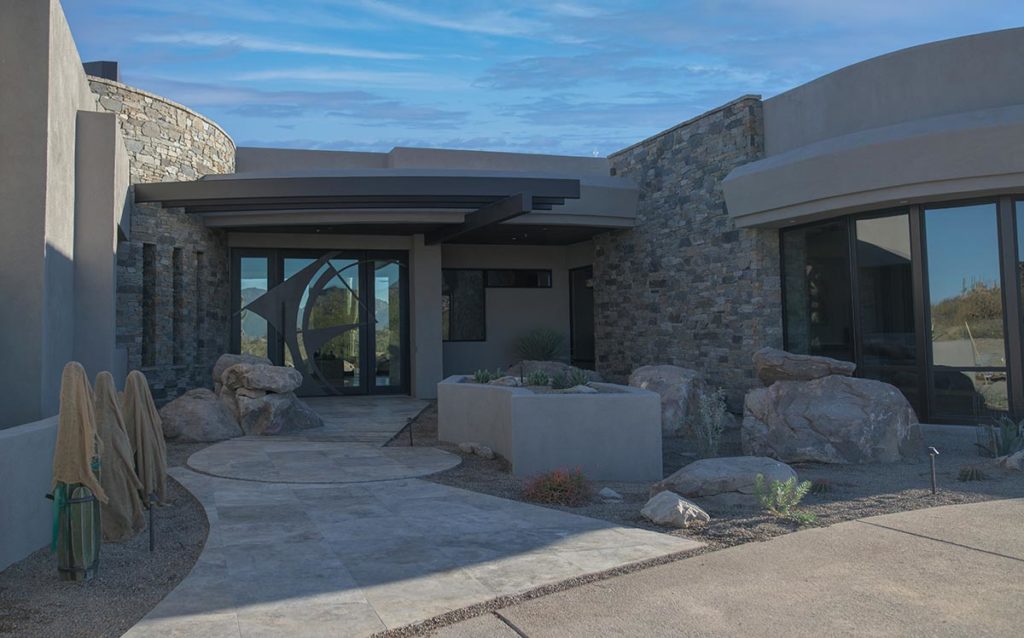 A home in Vail, Arizona that had newly installed glass door and floor to ceiling windows