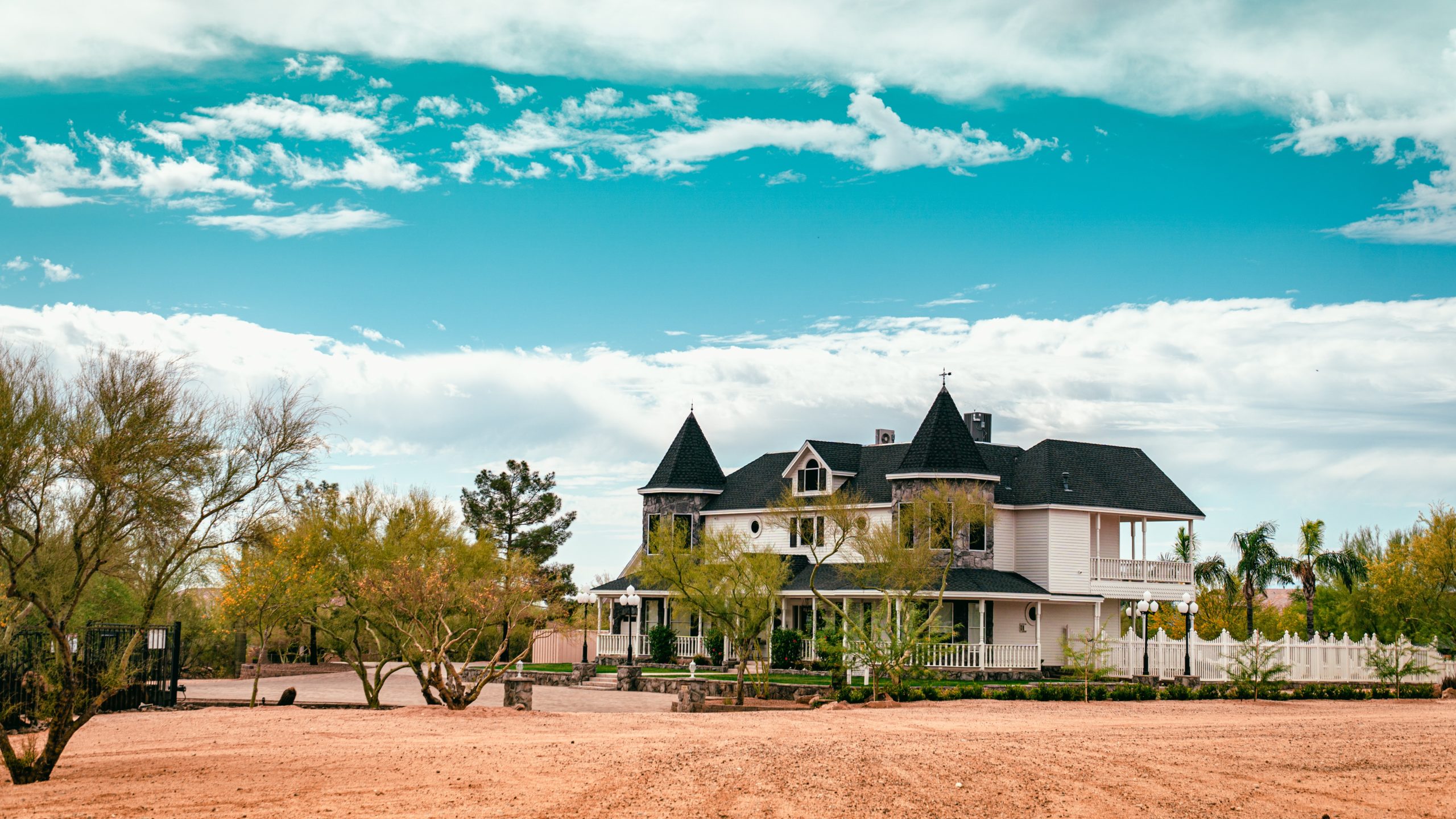 Historic Victorian-style white home in Phoenix, Arizona.